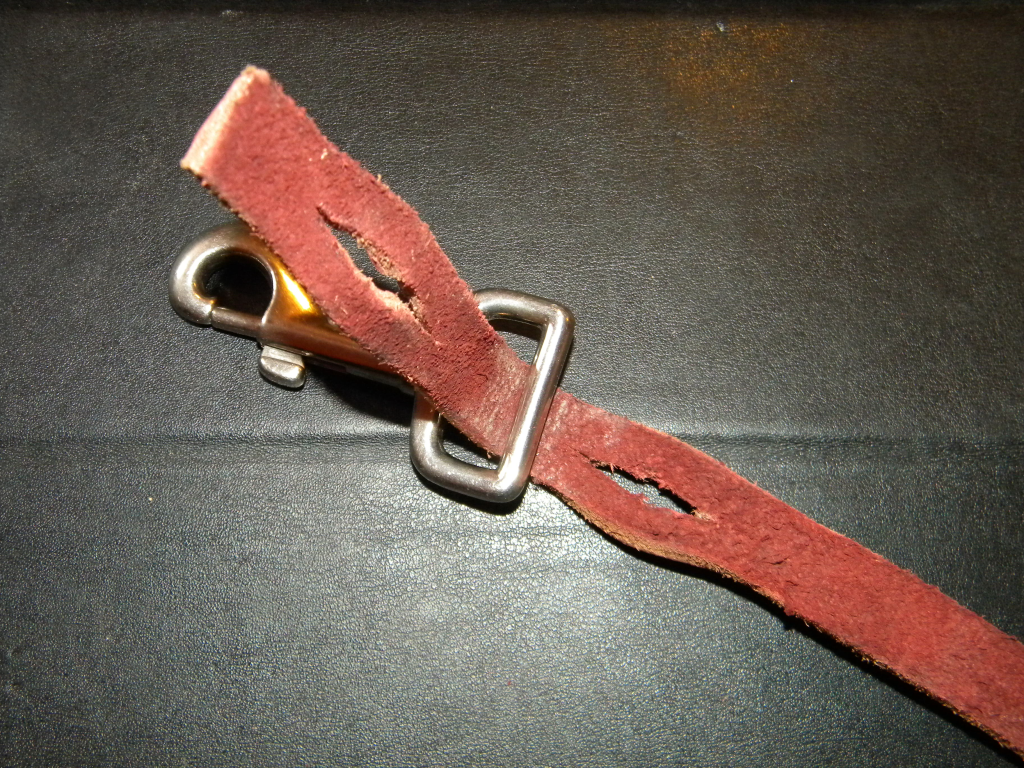A picture tutorial of homemade leather leashes with braided ends